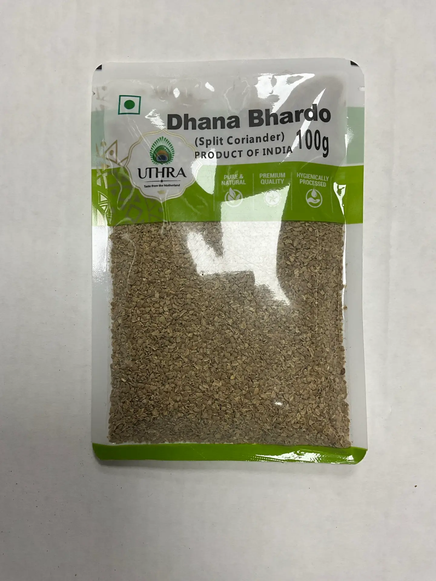7915984A-594B-4B05-B79B-3Abd0085134E-591-0000006Caf0A93Cf_File-Scaled-1.Webp UTHRA DHANA BHARDO(SPLIT CORIANDER) 100G - Image 1